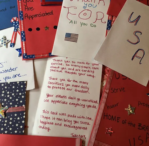 Handmade cards addressed to the military and veterans. 